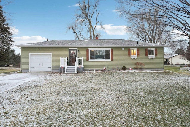 ranch-style house featuring a garage