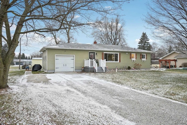 ranch-style house with a garage