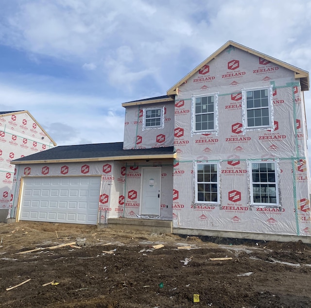 property under construction with a garage