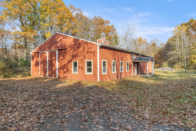 exterior space featuring an outbuilding