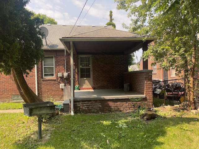 view of property exterior with a lawn