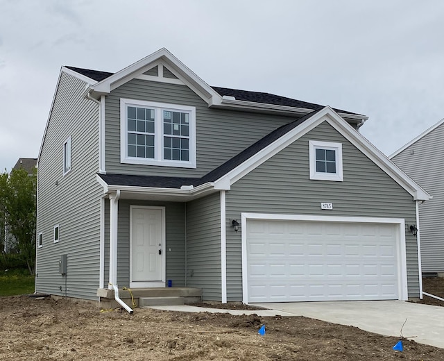 8745 E Sturtevant Ave, Richland, MI 49083 - traditional-style house featuring driveway and a garage