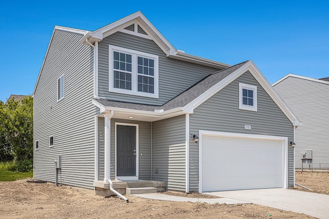 8745 E Sturtevant Ave, Richland, MI 49083 - traditional-style house featuring concrete driveway and roof with shingles