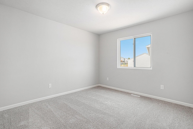8745 E Sturtevant Ave, Richland, MI 49083 - carpeted spare room featuring baseboards