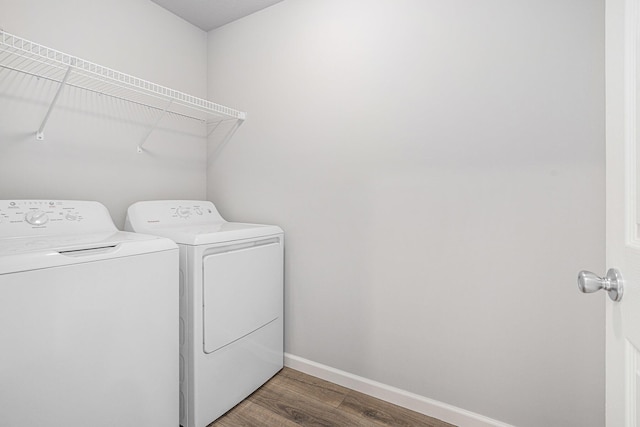 8745 E Sturtevant Ave, Richland, MI 49083 - laundry area with independent washer and dryer and light wood-style flooring