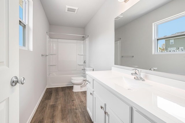 8745 E Sturtevant Ave, Richland, MI 49083 - full bath featuring vanity, wood finished floors, and tub / shower combination