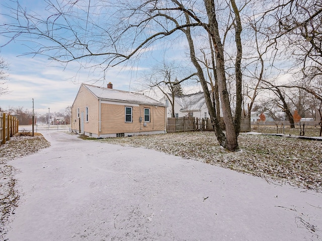 view of snow covered property