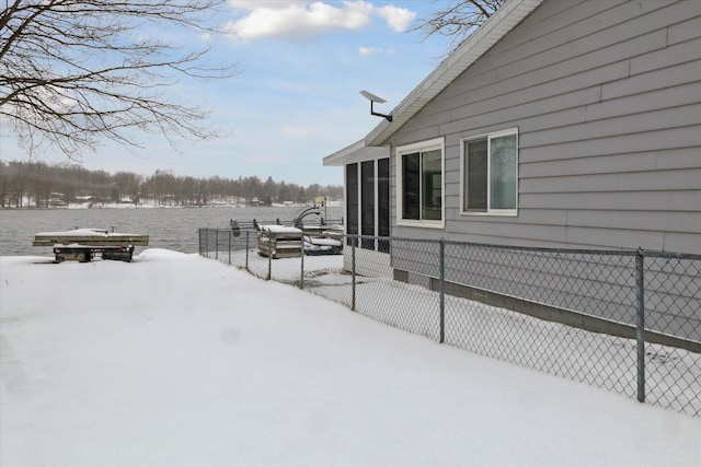 view of snow covered property