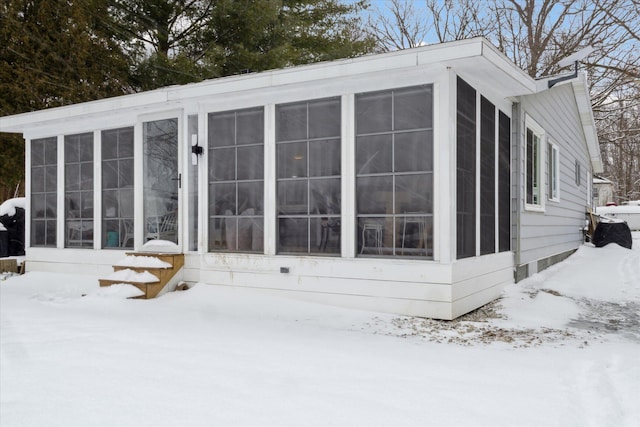 view of snow covered property