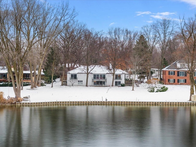 exterior space with a water view