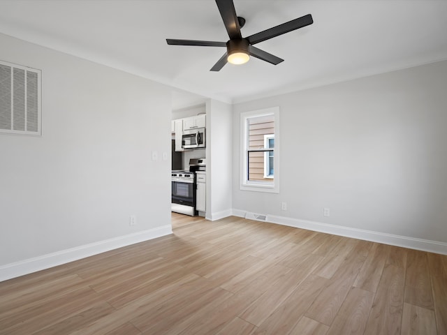 unfurnished living room featuring light wood-type flooring and ceiling fan