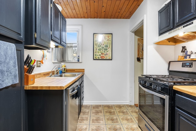 kitchen featuring butcher block countertops, wooden ceiling, sink, and stainless steel appliances