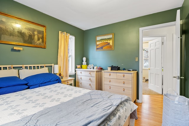 bedroom featuring light hardwood / wood-style flooring