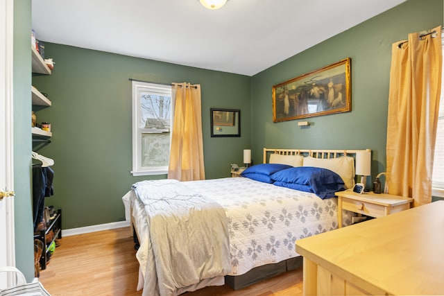 bedroom with light hardwood / wood-style floors