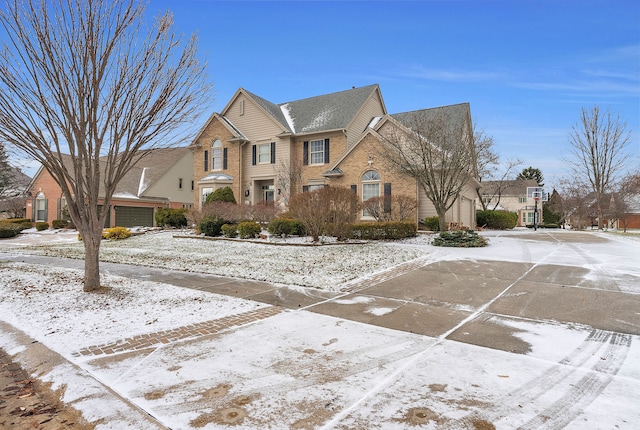 traditional-style home with brick siding