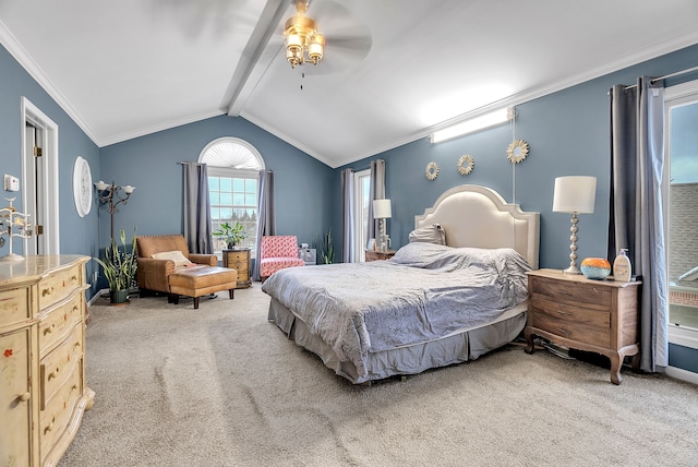 bedroom with carpet floors, lofted ceiling with beams, a ceiling fan, and crown molding