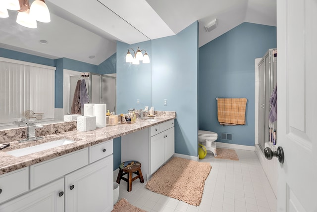 full bathroom featuring lofted ceiling, a stall shower, visible vents, and a sink