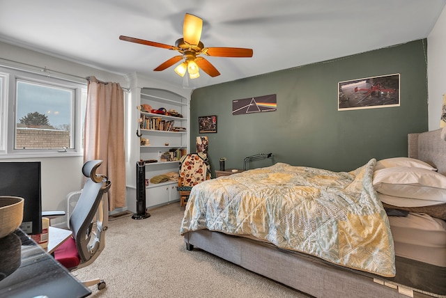 bedroom with light carpet and ceiling fan