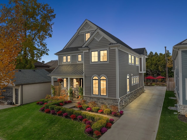 view of front of house with a yard