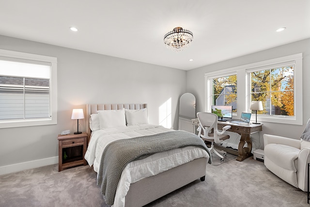 bedroom with light colored carpet