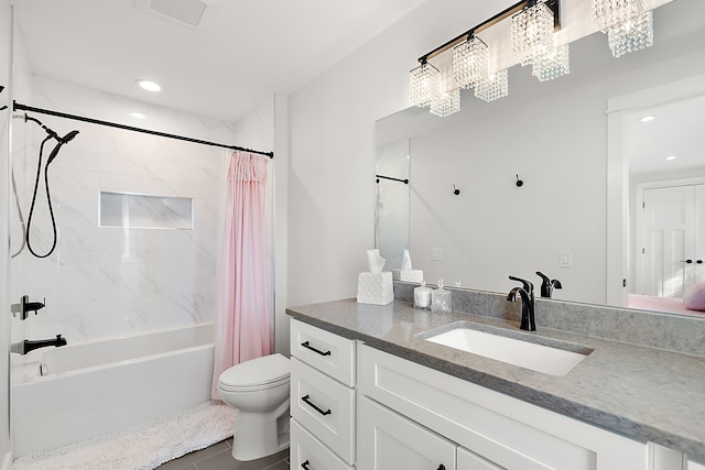 full bathroom with shower / bath combination with curtain, tile patterned floors, vanity, a notable chandelier, and toilet