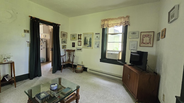 living room featuring cooling unit, light carpet, and a baseboard radiator