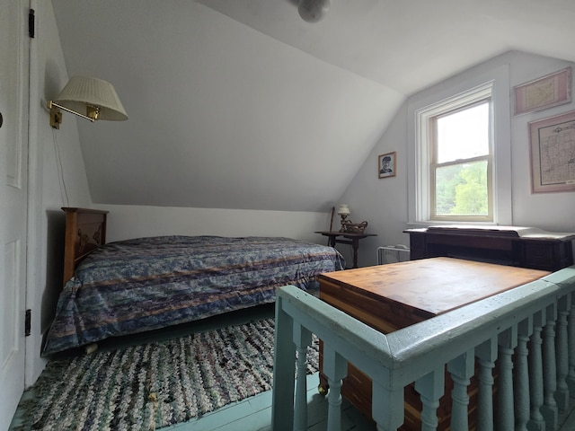 bedroom featuring vaulted ceiling