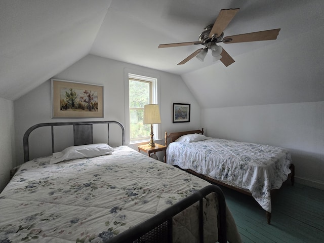 bedroom featuring carpet flooring, ceiling fan, and vaulted ceiling