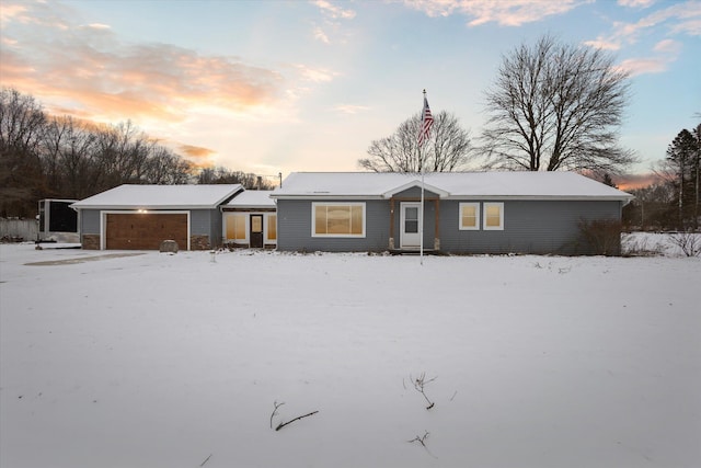 ranch-style home with a garage