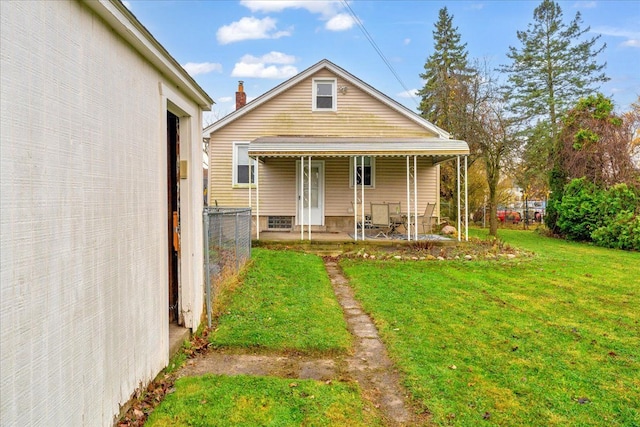 exterior space featuring a patio area and a yard