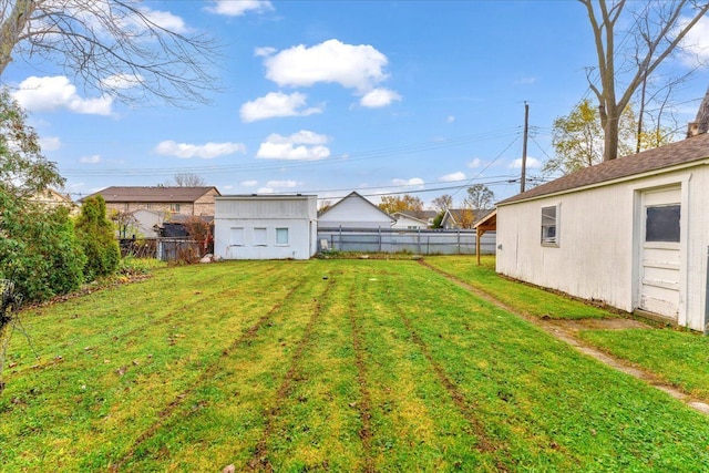 view of yard with an outdoor structure