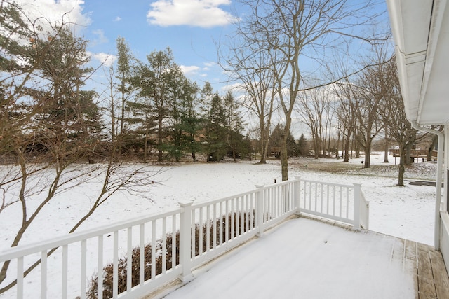 view of snow covered deck