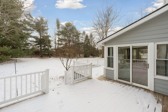 view of snow covered deck