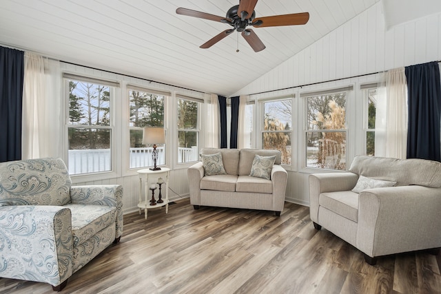 sunroom featuring ceiling fan, wooden ceiling, and vaulted ceiling