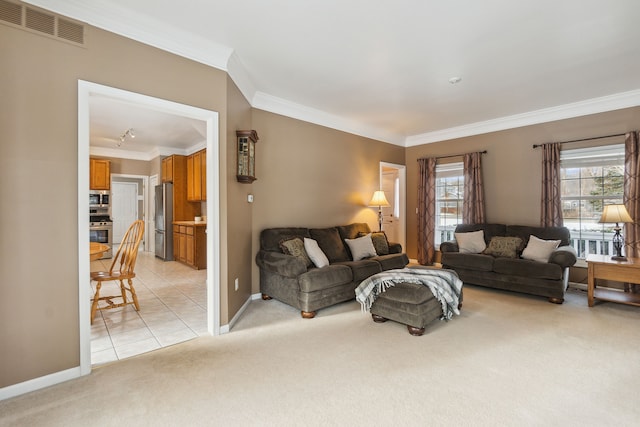 carpeted living room with ornamental molding