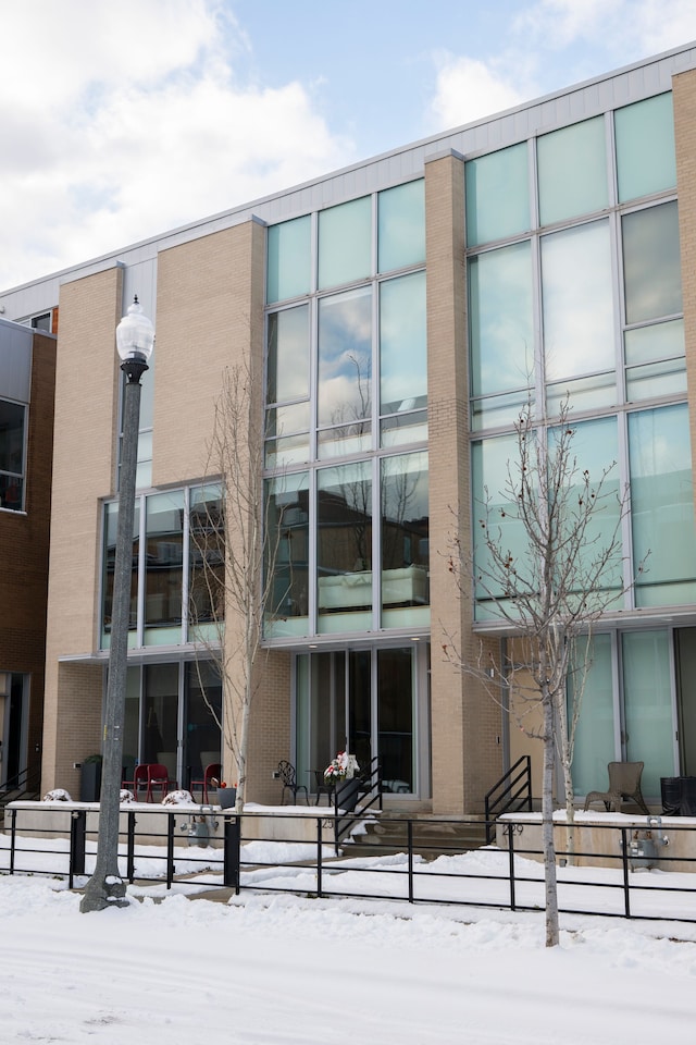 view of snow covered building