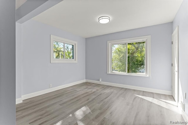 empty room with light wood-type flooring