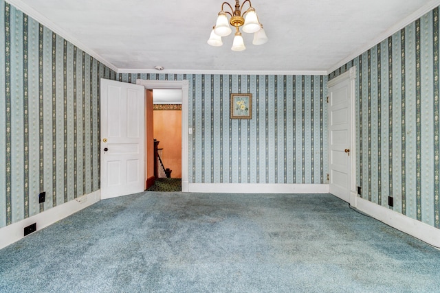 empty room featuring wallpapered walls, carpet, and ornamental molding