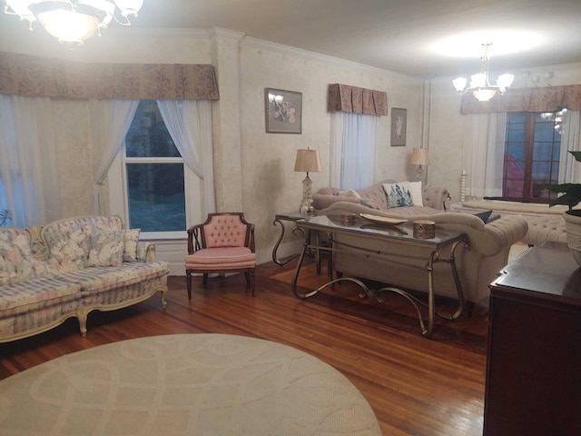 living room with a chandelier and wood-type flooring