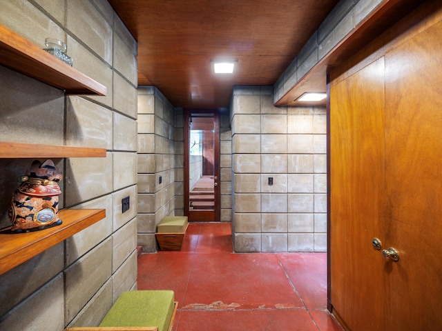 hall featuring wooden ceiling