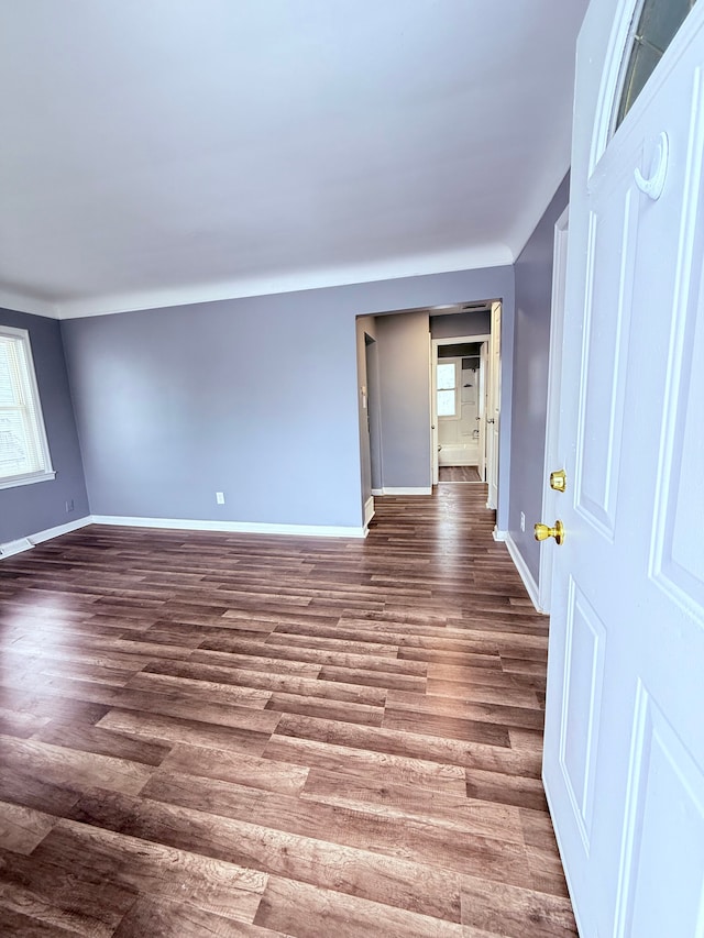 empty room featuring dark hardwood / wood-style floors