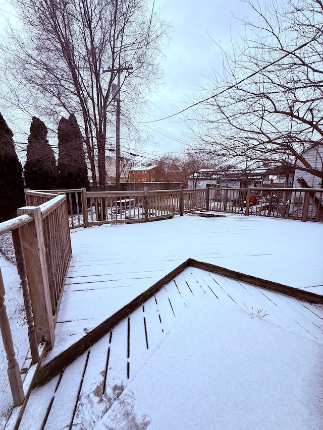 view of snow covered deck