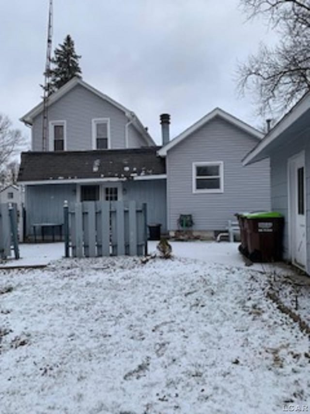 view of snow covered property