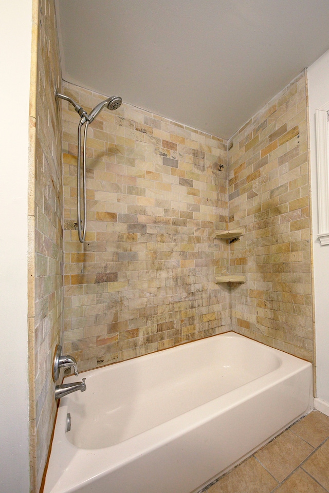 bathroom with bathing tub / shower combination and tile patterned flooring