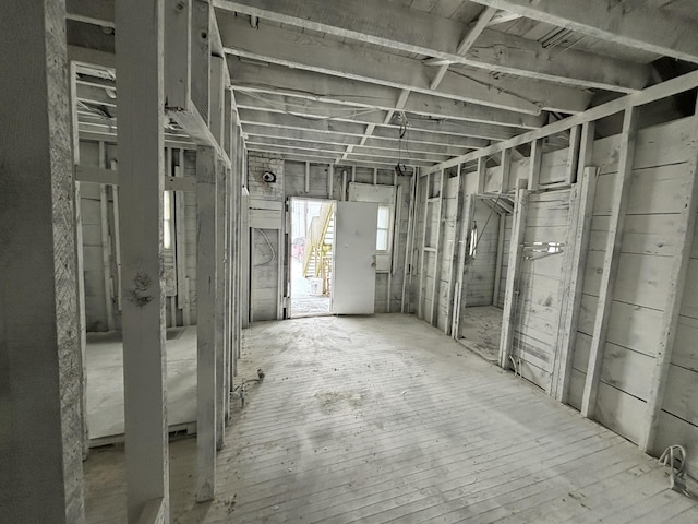 miscellaneous room with wood-type flooring