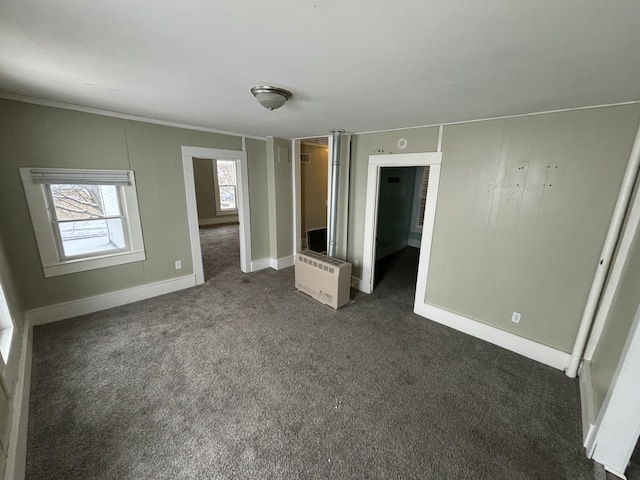 unfurnished bedroom featuring dark colored carpet