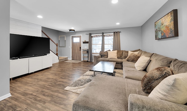 living room featuring dark wood-type flooring