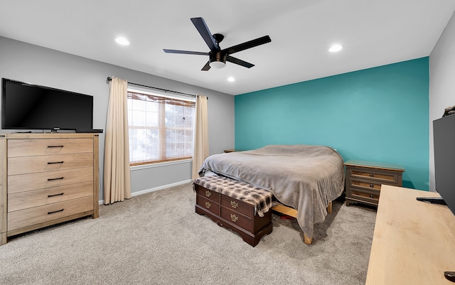 carpeted bedroom featuring ceiling fan