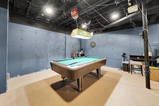 playroom with concrete flooring and billiards