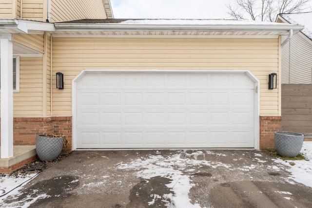 view of snow covered garage